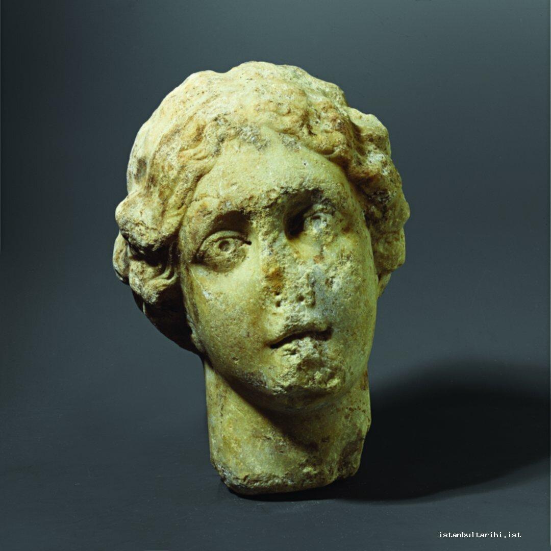 58- Woman head, Roman period