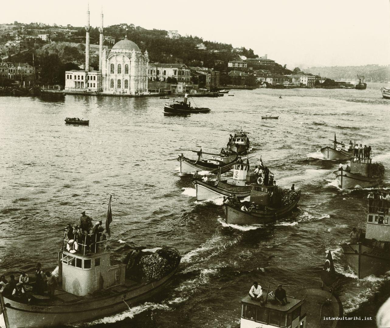 12- Fishers of Istanbul are in Bosporus. Mecidiye (Ortaköy) Mosque in the back plan