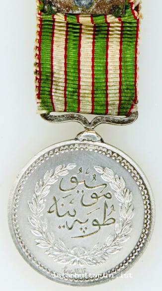 1a- The front and back of the medallion awarded to those who served in 1894 Earthquake (BOA TŞH, no. 394)