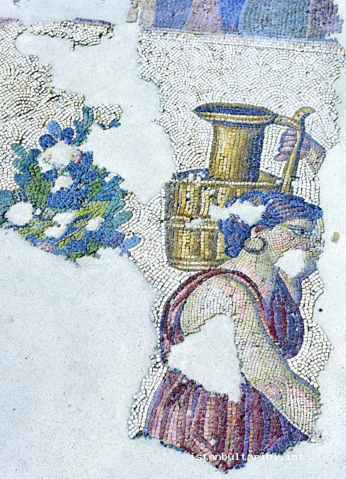 6- A women carrying water in a pitcher (Mosaic Museum)