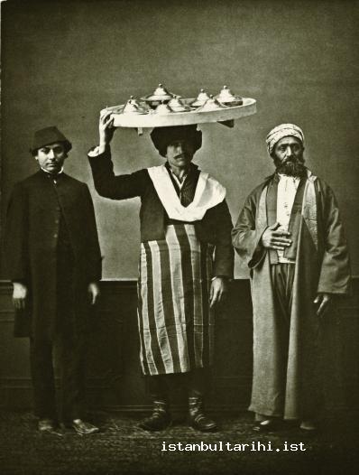 28- A man from Istanbul in his old clothes (right) and a young man in new clothes (left)