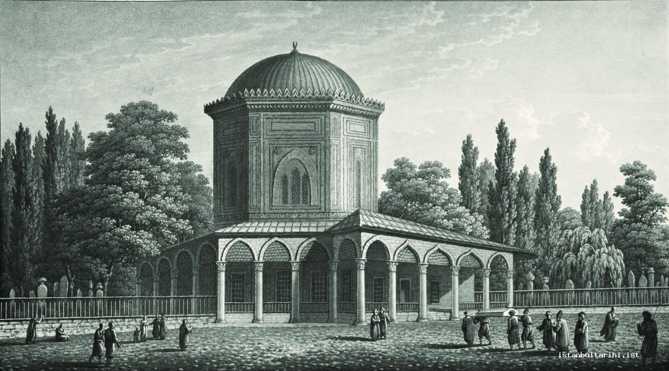 14- A funeral taken to burial in the fenced graveyard of Süleymaniye Mosque, in front of the tomb of Sultan Süleyman I (Pertusier)