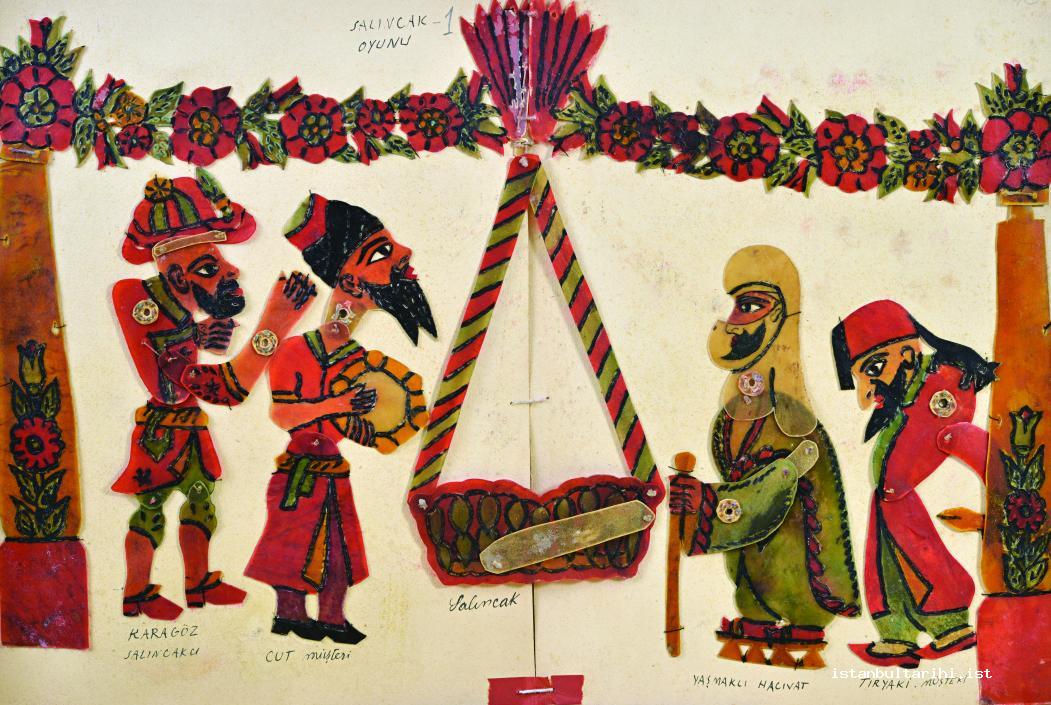 10- Karagöz (on the left) and Hacivat (one with scarf) in the game of <em>Salıncak</em> (Istanbul Metropolitan Municipality City Museum)