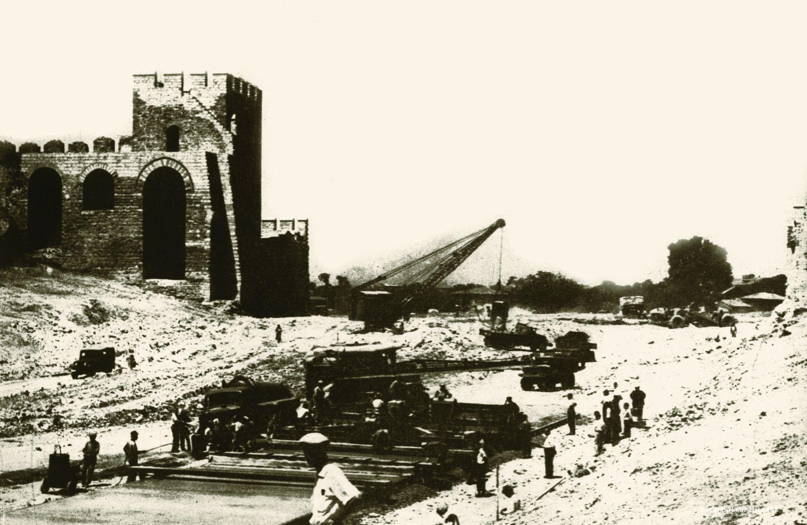 3- “The restored bastions around Topkapı walls which are at the beginning of
    50-meter wide Millet Avenue and at the entrance gate of Edirne-Istanbul state
    highway. They have the characteristics that might invoke the most effective
    impression upon every traveler coming from Europe and entering to our city. This
    picture shows the concrete mixer pouring 25 cm thick concrete at the beginning of
    Millet Avenue.”