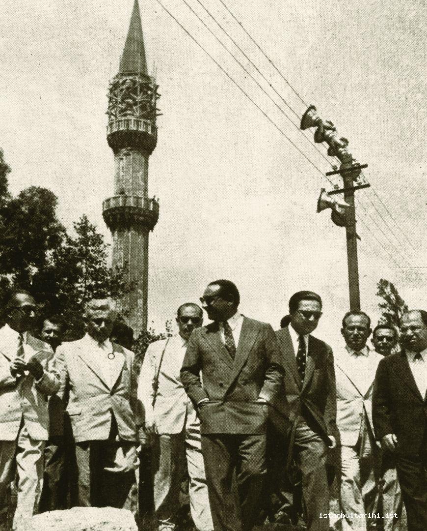 9- “In this picture, Prime Minister Adnan Menderes while dictating his orders to
    those in charge about working on the monuments of the city attain an identity
    fitting to the magnificence and beauty of the city”
    